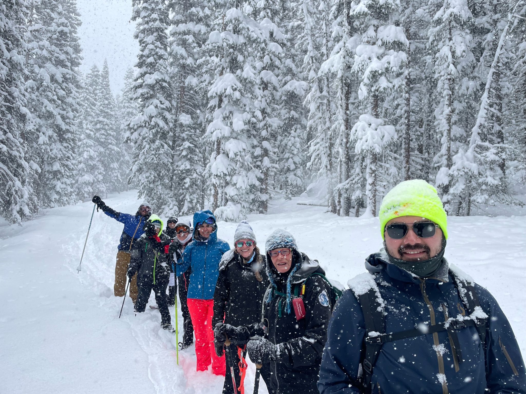 Group of people hiking in snow