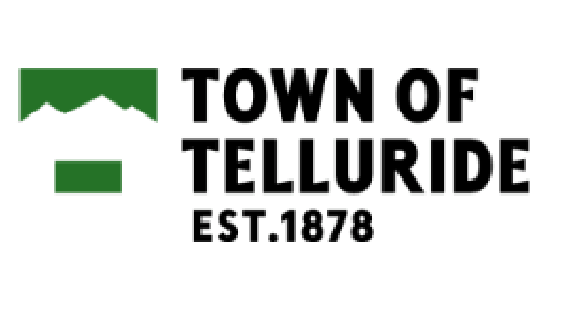 Logo for the Town of Telluride featuring a stylized green mountain graphic to the left. The text reads "TOWN OF TELLURIDE" in bold black letters and "EST. 1878" below it.